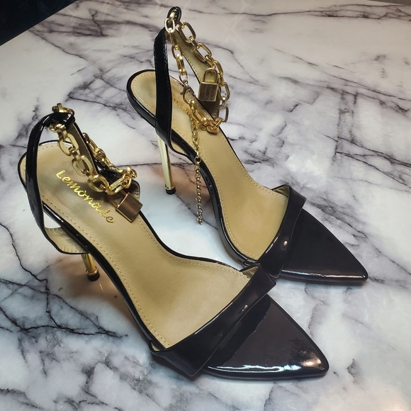 Sexy Gold and BLank Sandals - Picture 1 of 8